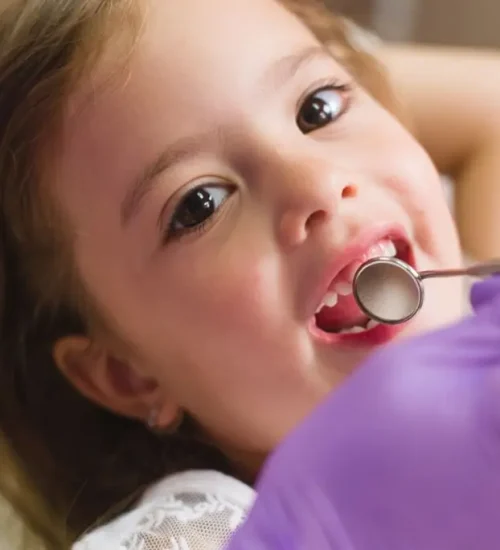 young-girl-having-teeth-examined